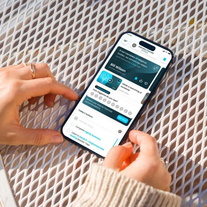Addiction recovery app interface displayed on a smartphone